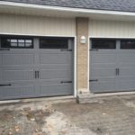 Two garage doors painted grey