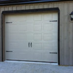 Single garage door with black trim