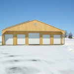 Newly built garage in open field